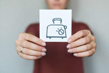 Picture icon in the hands of toaster