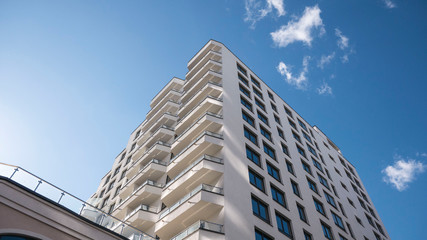 facade of a residential building fragment low angle view against the sky