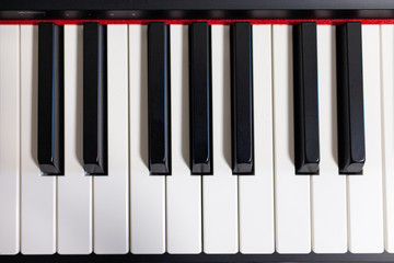 Piano keys view from above. Professional instrument