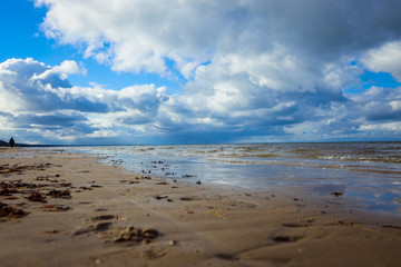 Sandy Jurmala Coastline under Cloudy Blue Sky, Latvia
