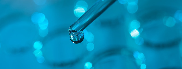 Test tube row. Concept of medical or science laboratory, liquid drop droplet with dropper in blue...