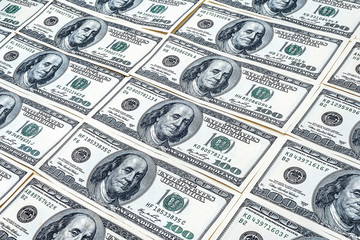One hundred dollars. Many US dollars banknotes background. Hundred dollar bills.