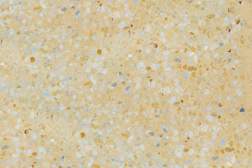 Terrazzo flooring marble stone wall texture yellow abstract background. Colorful terrazzo floor tile on cement surface