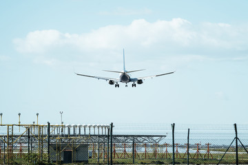 plane landing at the airstrip header
