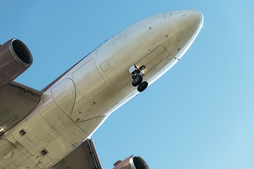 detail of the nose of a plane flying