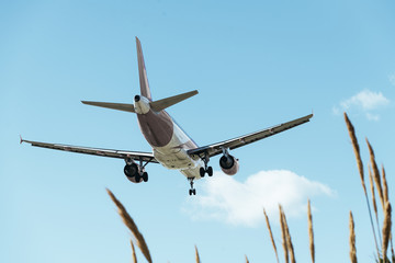 commercial aircraft with the landing gear deployed