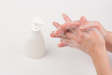 Fototapeta premium Closeup of children washing hands isolated. Cleanliness and body care concept. Global Handwashing Day Concept/Washing hands with soap
