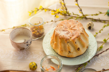 Polish Easter babka yeast cake. Glazing traditional baba raisin bread.