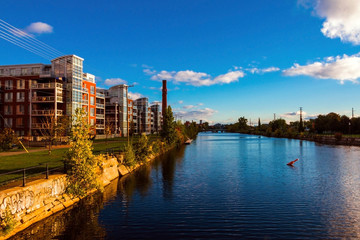 Fototapeta premium Condominiums line the shores of the Lachine Canal in Montreal. 