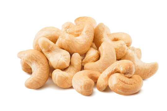 Big pile of cashew nuts isolated on white background