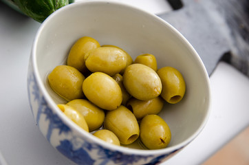 
green fresh olives in a bowl