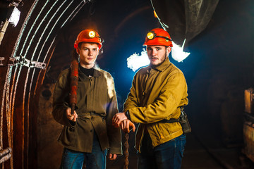 Two miners in the mine