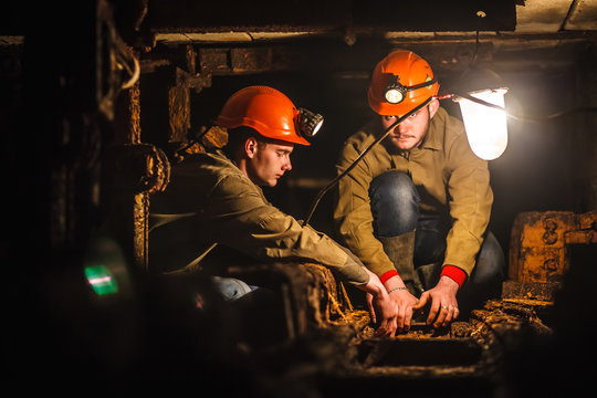 Two miners in the mine