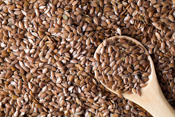 flax seeds and wooden spoon