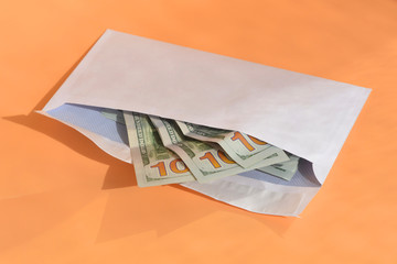 dollar money in the envelope . bonus, reward, benefits concept.