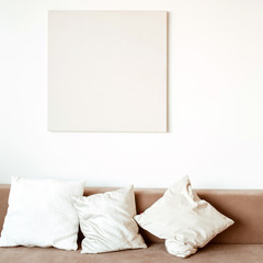 Modern interior design. Stylish bright living room decorated with comfortable sofa, pillows,...
