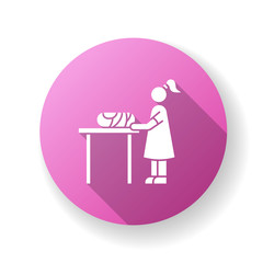Changing table pink flat design long shadow glyph icon. Restroom for mom and child. Mother changing diaper for baby. Newborn kid care. Nanny dressing infant. Silhouette RGB color illustration