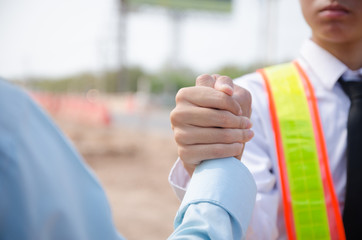 Business people construction together to build a mutually beneficial business relationship