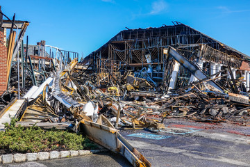 The interior structure of a building destroyed by fire full of debris
