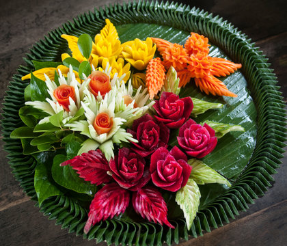 Edible flowers carved from brightly colored vegetables
