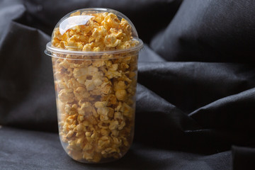 Popcorn in a large bucket.