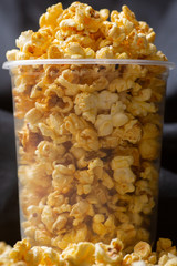 Popcorn in a large bucket.