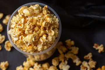 Popcorn in a large bucket.