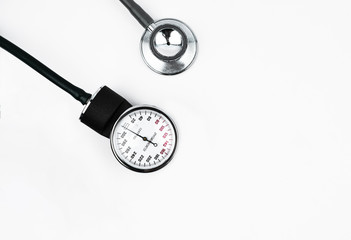 Two different essential part of a blood pressure measuring machine on a white background