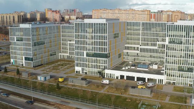 Ambulance moving along the Russian main infectious disease hospital in Moscow - Komunarka aerial view