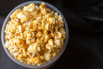 Popcorn in a large bucket.