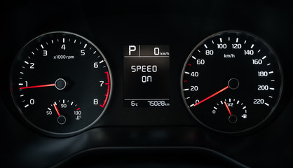 Car speedometer or meter panel. Dashboard close up.