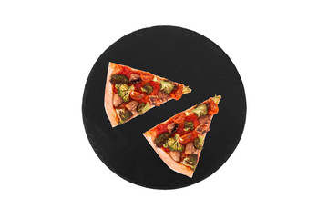 Two slices of pizza with veggie vegetables, on slate bottom, isolated on white, top view space for text