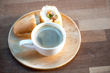 Hot fragrant coffee with bread for breakfast
