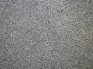 background copy space texture of abstract dark grey tinted stone concrete wall or ground scratches crack sand old aged worn grunge mood feeling effect, blank wallpaper canvas for texturing photographs