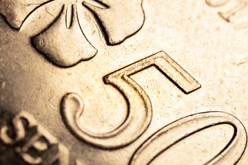 macro photography of 50 Malaysian ringgit cent. The bank negara fifty cent coin of Malaysia. Sharp detailed capture of the Malaysia character on the RM 50 sen coin. microscopic picture of this coin © Holger