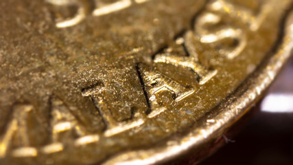macro photography of 50 Malaysian ringgit cent. The bank negara fifty cent coin of Malaysia. Sharp detailed capture of the Malaysia character on the RM 50 sen coin. microscopic picture of this coin © Holger