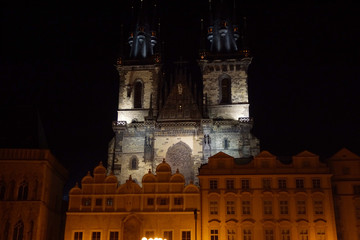 Fototapeta na wymiar Prague (Czech Republic). Night view of the Church of Týn.(Chrám Matky Boží před Týnem) in Old Town Square (Staroměstské náměstí) of the city of Prague