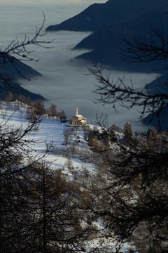 the fog rises in the Maira Valley