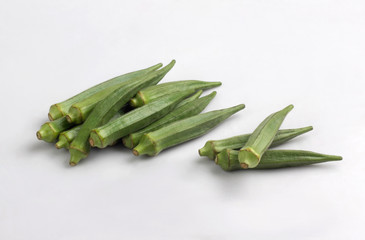 Bunch of fresh okra isolated on white