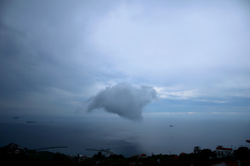 
Skopelos island,Greece , 5/13/2019 , the port of Glossa, a cloud that looks like a dragon