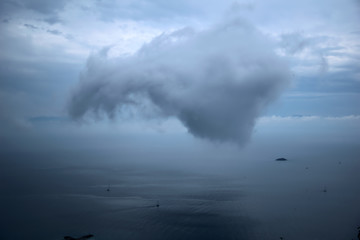 
Skopelos island,Greece , 5/13/2019 , the port of Glossa, a cloud that looks like a dragon