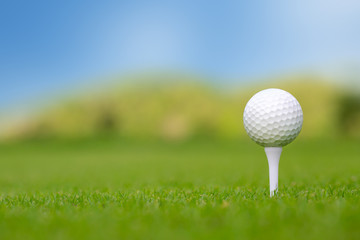 Golf ball on tee ready to be shot