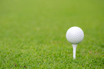 Golf ball on tee ready to be shot