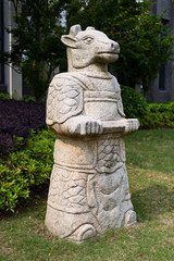Fototapeta na wymiar Stone sculpture of zodiac animal in Chinese Park