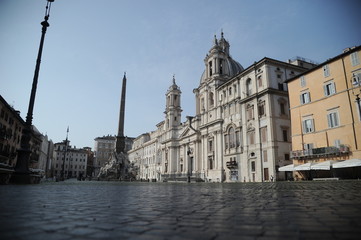 Rome, Italy-29 Mar 2020: Popular tourist spot Piazza NAvona is empty following the coronavirus confinement measures put in place by the governement, Rome, Italy