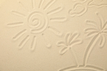 Fototapeta na wymiar Sea sand with painted sun, clouds and palms on island