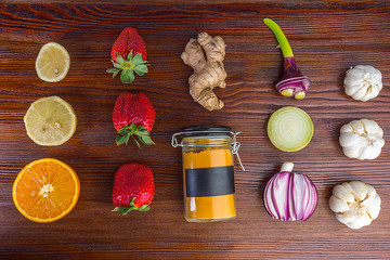 Healthy products for Immunity boosting and cold remedieson wooden background