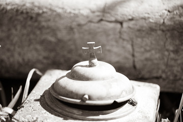 old holy water vessel on grave, cemetery, silence