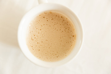 Glass Cup Of Coffee. Closeup Coffee With Milk. Cappuccino. Coffee foam