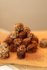 Homemade chocolate, cocoa and hazelnut balls. Selective focus.